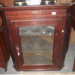 Georgian oak glazed hanging corner cupboard having single door and straight fronted shelves to the