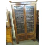 Early 20th Century oak lead and stain glass panelled two door display cabinet or bookcase, appears