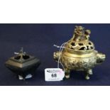 Oriental, probably Chinese archaic style yellow metal tripod censer with 4 character marks to the