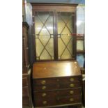 19th Century mahogany two staged astragal glazed bureau bookcase with adjustable shelves. (B.P.