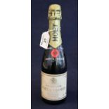 Moet and Chandon Premiere Cuvee finest extra quality bottle of champagne. (small bottle) (B.P. 21% +