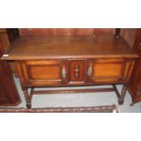 Early 20th Century oak two door blind panelled low sideboard or cupboard on bobbin turned