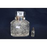 Large star cut silver topped scent bottle with stopper, Birmingham hallmarks. Together with a