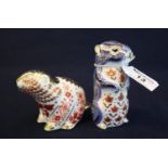 Royal Crown Derby bone china paperweight of a seated beaver, together with Royal Crown Derby