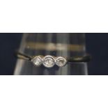 18ct gold diamond three stone ring. Ring size P. Approximate weight 1.9g. (B.P. 21% + VAT)