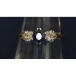 18ct gold, diamond and sapphire three stone ring. Ring size K. Approximate weight 2g. (B.P. 21% +