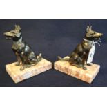 A pair of Art Deco style spelter book ends in the form of seated Alsatians. (B.P. 21% + VAT)