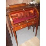 Edwardian mahogany inlaid cylinder bureau with pull out writing desk above two drawers standing on