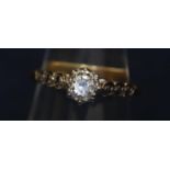 18ct gold and diamond solitaire ring with diamond shoulders. Ring size J. Approximate weight 2.