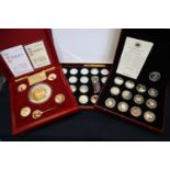 A collection of Chinese panda silver coins in fitted case, together with another cased set of