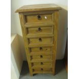 Modern pine straight front narrow chest of seven drawers. (B.P. 21% + VAT)