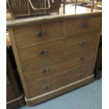 Edwardian pine straight front chest of two short and three long drawers on a projecting base with