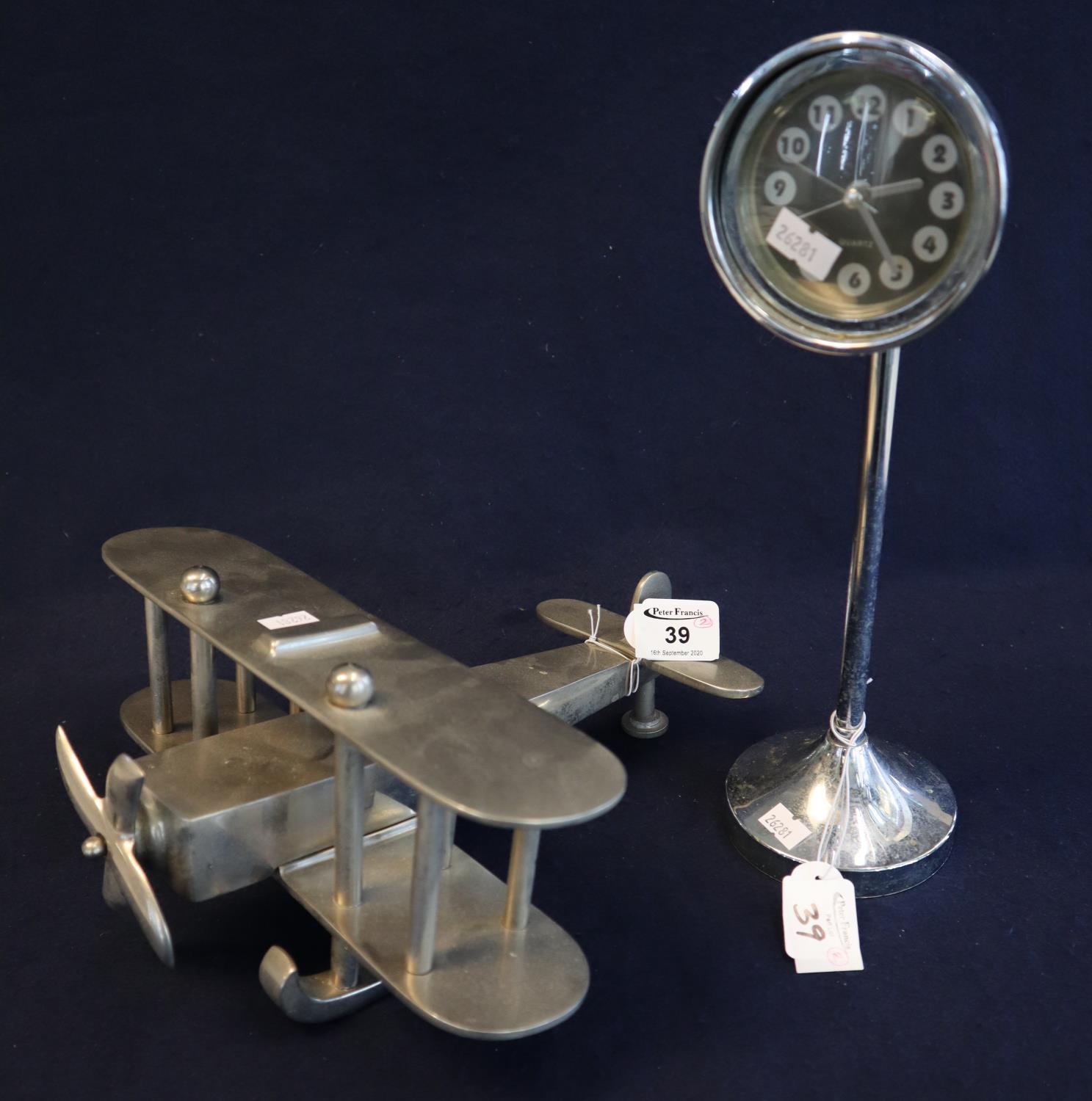 Unusual novelty chrome finish extending quartz movement clock in the form of a head lamp, together