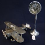Unusual novelty chrome finish extending quartz movement clock in the form of a head lamp, together