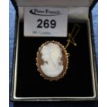 Oval shell cameo brooch set in 9ct gold beaded mount. (B.P. 21% + VAT)