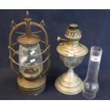 Vintage Veritas Pax metal and glass single hand burner, together with another oil burner with