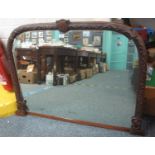 Victorian carved walnut framed arched over mantel mirror with shield dated 1854. 112cm wide