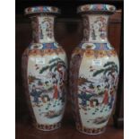 Pair of oriental pottery vases. One printed with printed masked base made in China, decorated with
