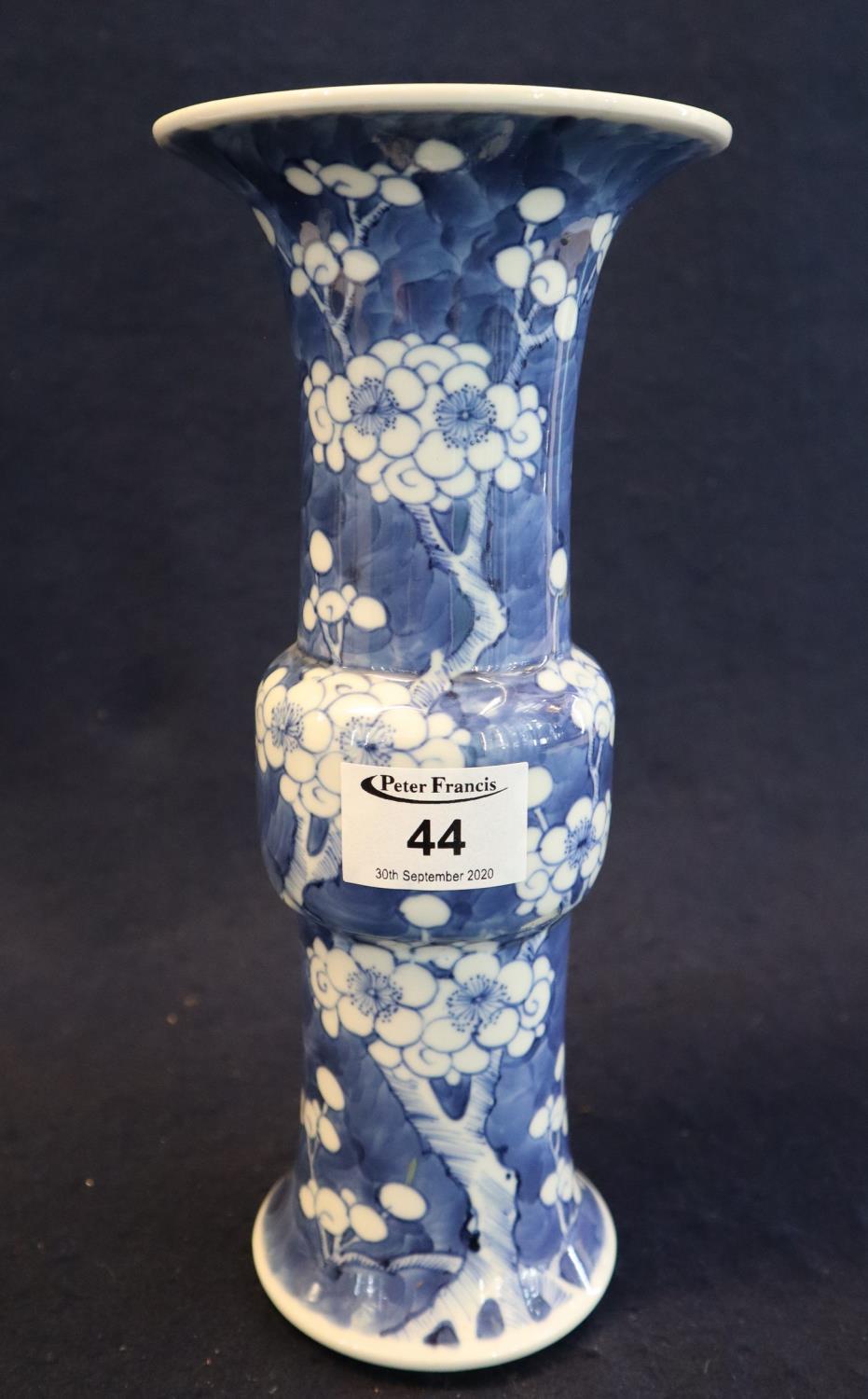 Chinese porcelain archaic design Gu vase, overall decorated with prunus blossom on cracked ice