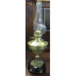 Early 20th century brass double burner oil lamp with brass reservoir on fluted pedestal and