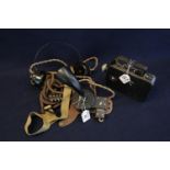 British military style telephone with chest mounted mouth piece and headphones, together with a