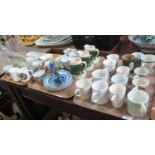 Three trays of assorted china and other items to include commemorative mugs, Toby jugs, cow creamer,