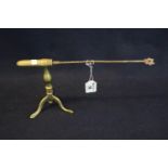 Antique brass gophering iron, together with a brass tripod gophering iron stand. (2) (B.P. 21% +