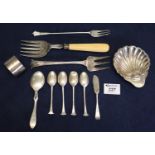 Collection of assorted mixed silver cutlery items including teaspoons, bread forks, pickle fork,