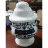 19th century pottery two-handled, blue and white apothecary jar and cover with pierced lid. (B.P.