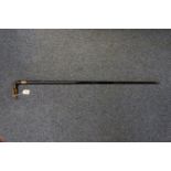 19th century ebony walking cane with pierced horn molded handle, having gold plated mounts. (B.P.