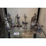 Collection of pewter figurines and similar items to include printer from the Evergreen collection,