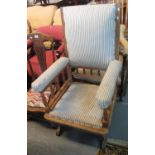 Late 19th/early 20th century American rocking chair with padded upholstery. (B.P. 21% + VAT)