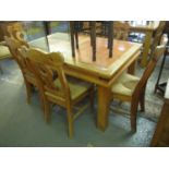 Modern pine kitchen table inset to the top with tiles, together with a set of six pine kitchen