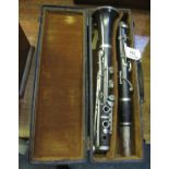 A Gerome wooden clarinet in appearing original fitted box. (B.P. 21% + VAT)