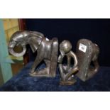 Hard stone pair of book ends in the form of an elephant, together with a hard stone abstract
