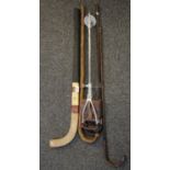 Collection of walking sticks together with a shooting stick and a hockey stick . (B.P. 21% + VAT)