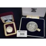 1967 Prince Charles investiture silver medallion 2.2 oz troy approx, and a Queen Elizabeth II silver