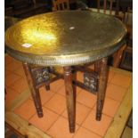 Middle eastern brass tray top folding table . (B.P. 21% + VAT)