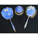 Three matching silver dressing table items with blue guilloch enamel decoration, hand brush, hand