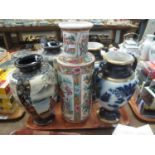 Pair of Japanese pottery baluster vases, together with a modern Oriental design cylinder vase, and a