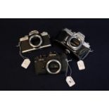 Minolta SRT10 1R1b 35mm SLR camera body in part leather case. Together with Minolta XG1 35mm SLR