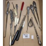 Collection of assorted silver handled and other button hooks various. (B.P. 21% + VAT)