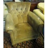 Early 20th century beige button back upholstered arm chair on turned supports and castors. (B.P. 21%