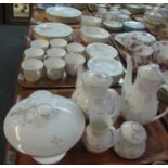 Four trays of Royal Doulton English fine bone china flirtation design tea and dinner ware items