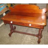 Victorian mahogany dressing table with shaped back and bobbin stretcher, two drawers. (B.P. 24%