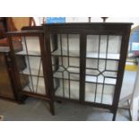 Edwardian stained mahogany two door display cabinet together with another with a early 20th