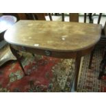 Early 19th century mahogany demilune side table with freize drawer on square tapering legs. (B.P.