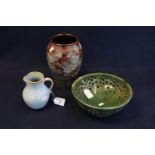 Three modern art pottery items to include Ewenny pottery brown glazed baluster vase, green ground