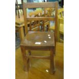 Small stained bar back child's or doll's chair with elm moulded seat. (B.P. 21% + VAT)