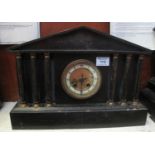 19th century black slate architectural two-train mantel clock in pillared portico design. 30 cm high